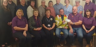 Tractor run group donates £1,500 to Blood Bike Wales