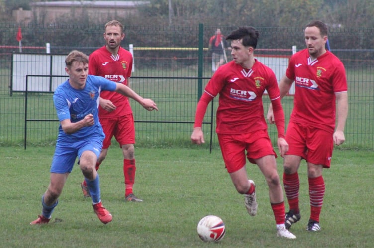 Brecon Corries in action during their 3-2 defeat to Croesyceiliog at Woodland Road