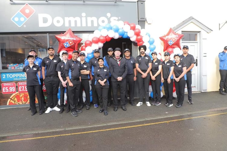 Mayor of Brecon, Cllr John Powell with the Domino's team at the new Brecon store