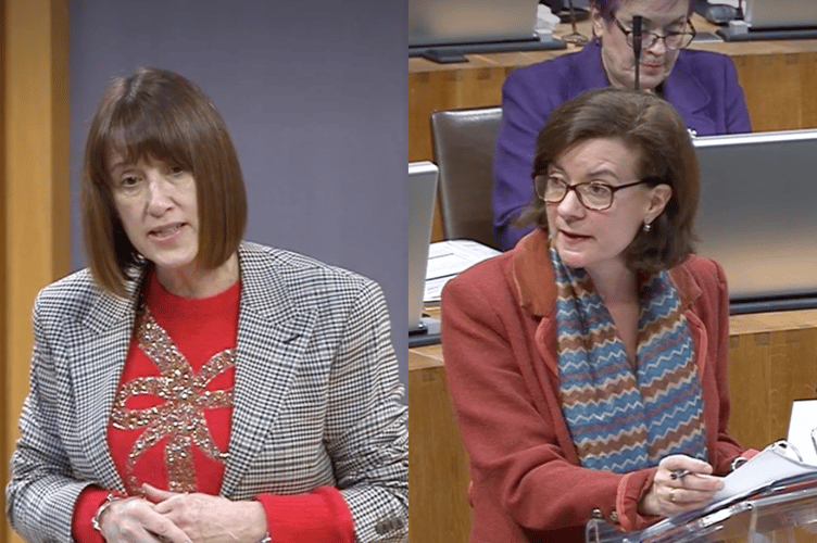 Jane Dodds (left) and Eluned Morgan discuss future power cable policy in the Senedd