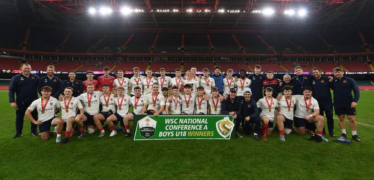 The victorious Llandovery College team celebrates after retaining their Welsh Schools and Colleges U18 title at the Principality Stadium