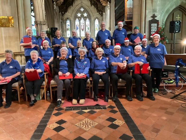 The Bracken Singers spread festive cheer at Holy Trinity Church during the The Bracken Trust’s Christmas Fair