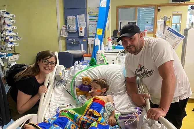 Freddie Julian leaving the paediatric intensive care unit with mum, Vickie and Dad, Stephen