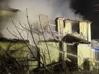 Roof and wall collapse in early morning house fire