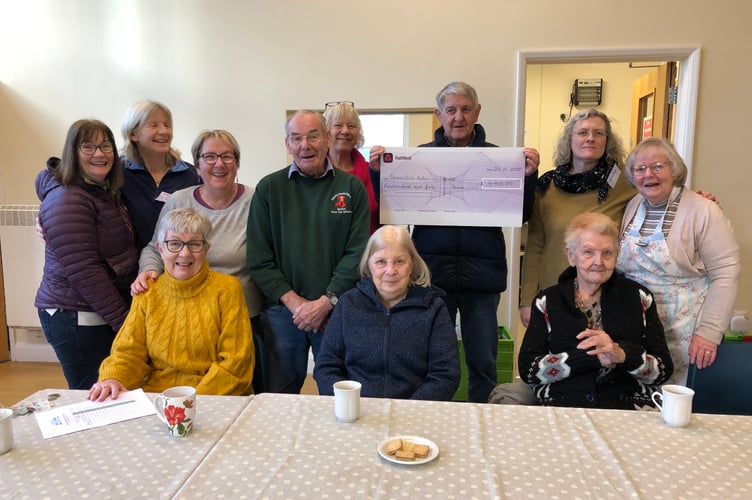 Bronllys Santa Group presenting a cheque for £440
