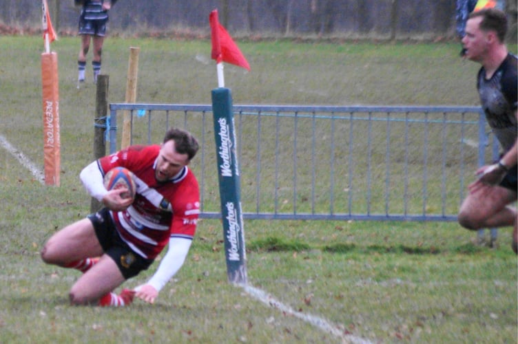 Sam Jones scores the first of his two tries