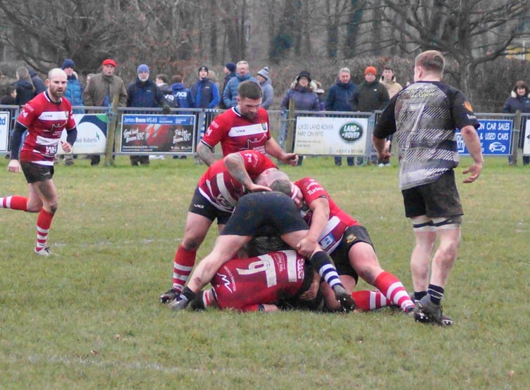 Brecon's Lewis Jones weighs up his options at a ruck