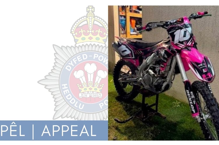A pink Kawasaki KXF 250 motorbike has been stolen
