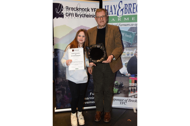 Darcy receiving her Best Actress (18 years or under) award