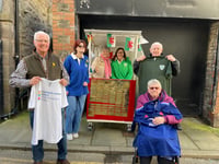 Rugby raffle raises over £1,000 for Cancer Research