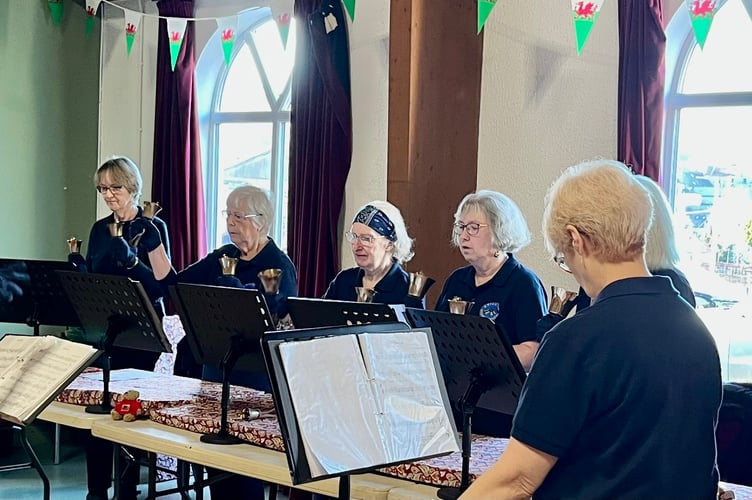  Photo of Knighton Handbell Ringers in action.