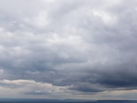 Sunny and partly cloudy today, warmer tomorrow with calm winds