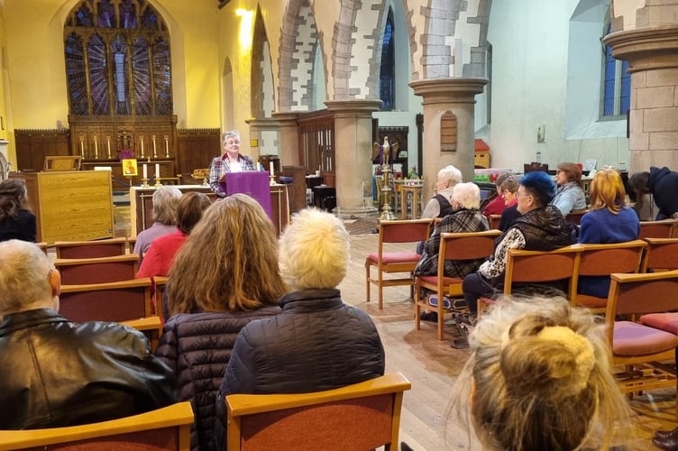 Dr Sarah Ward Clavier delivers an inspiring talk on the history of sub-postmistresses at St Mary's Church, Brecon