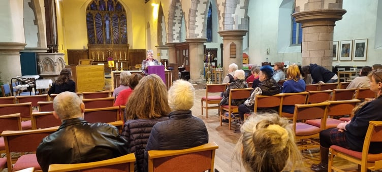 Dr Sarah Ward Clavier delivers an inspiring talk on the history of sub-postmistresses at St Mary's Church, Brecon