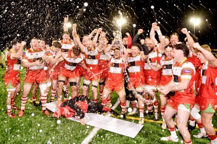 A champagne shower for the victorious Llandovery team