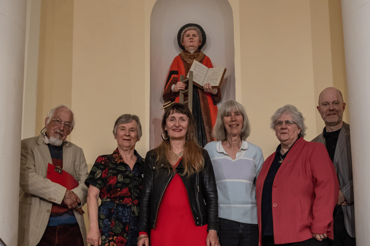 Left to right: William Gibbs, Elizabeth Jeffreys, Susan Adams, Carla Rapoport, Norena Shopland and Mike Williams in front of the new Gwenllian Morgan sculpture