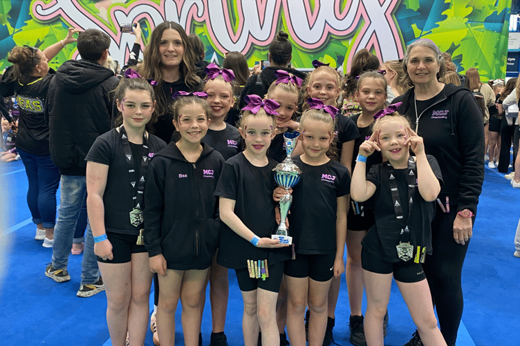 MCJ Cheerleading’s team 'Fearless' celebrate their first-place victory at the ICE Spring Thaw Out championship in Cardiff