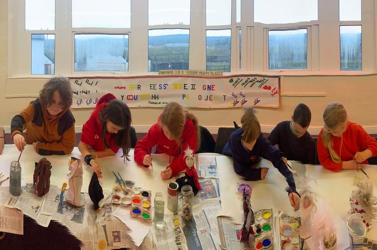 Young participants engage in creative arts activities in Presteigne
