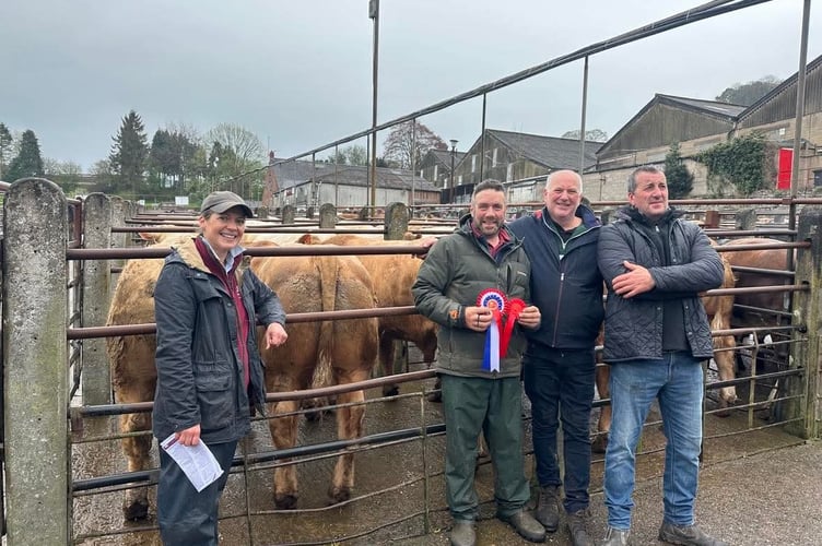 Left to right: Auctioneer Jenny Layton Mills, champion JB Morris, and judges Alastair Hargraves and Martin Wilcox