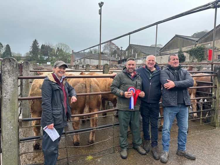 Left to right: Auctioneer Jenny Layton Mills, champion JB Morris, and judges Alastair Hargraves and Martin Wilcox