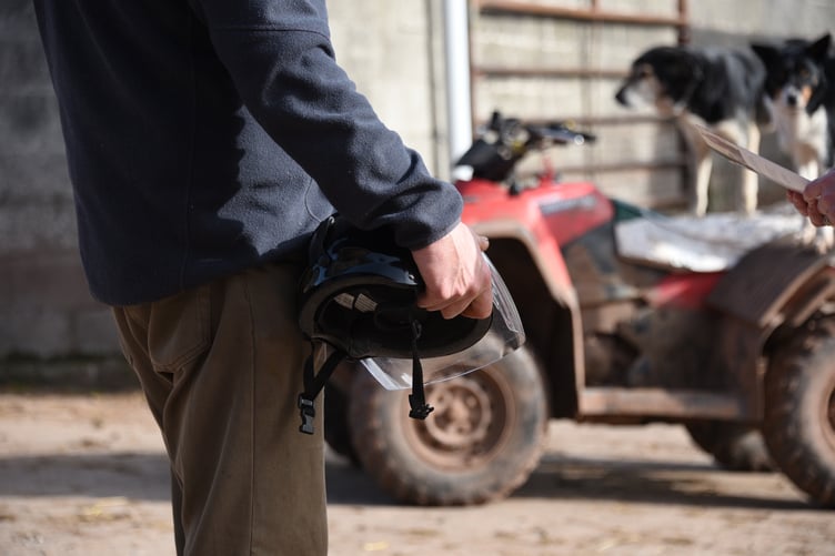 Farm safety helmet and quad bike