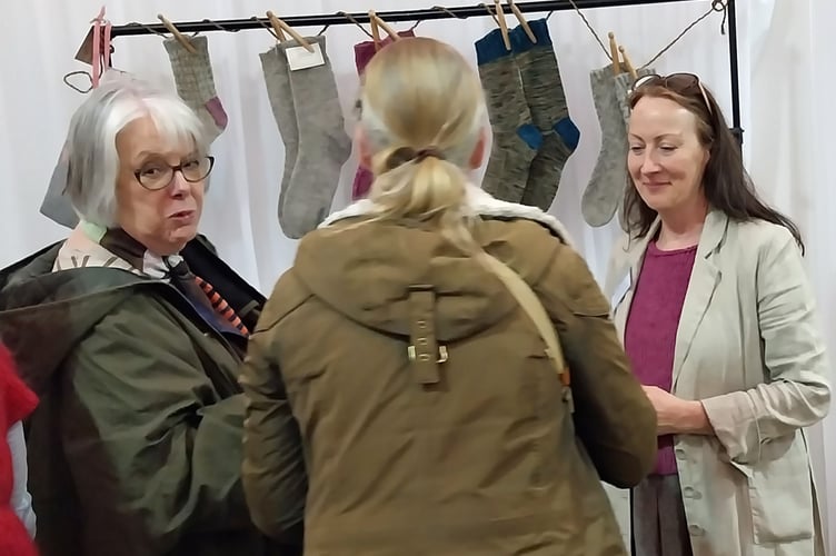 Helen Hickman (right) from Nellie and Eve busy on her stand at Wonderwool Wales