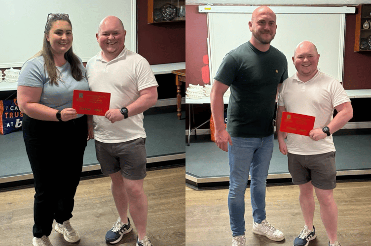 Chloe Cottle-Watkins and Will Prosser picking up their awards