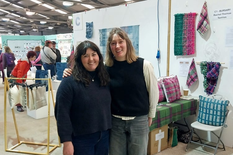 Nancy Una Simmons (left) and Rachel Thomas in front of their stands at Wonderwool Wales.
