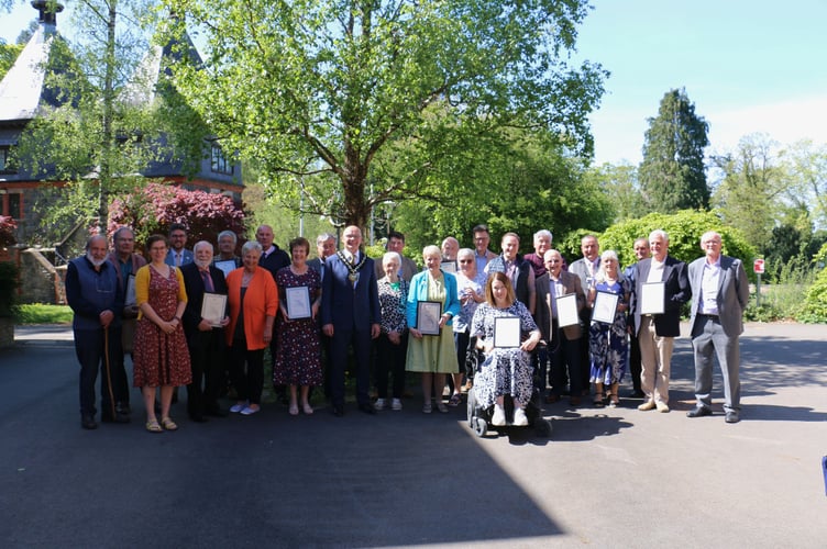 Silver Kite award winners pictured with Powys County Council Chair Cllr Jonathan Wilkinson at County Hall, Llandrindod Wells