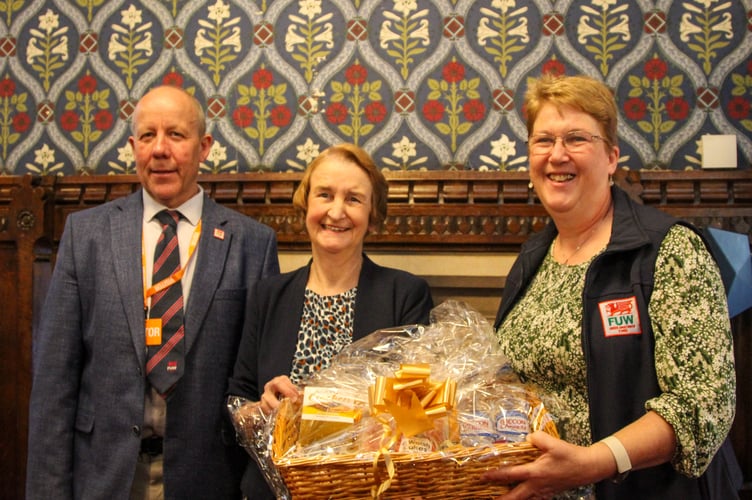 From left, FUW President Ian Rickman; Dame Nia Griffith MP, Minister in the Wales Office; and FUW Carmarthen Chair, and Caerfyrddin MP, Ann Davies during the 'Carmarthenshire Day' at Westminster Hall.