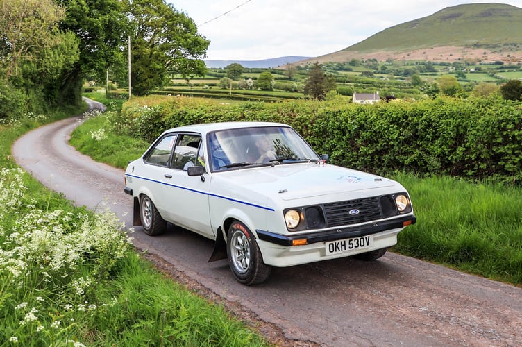 Steve Head with navigator Iain Tullie steer their Ford Escort RS200 around the lanes close to Llangors