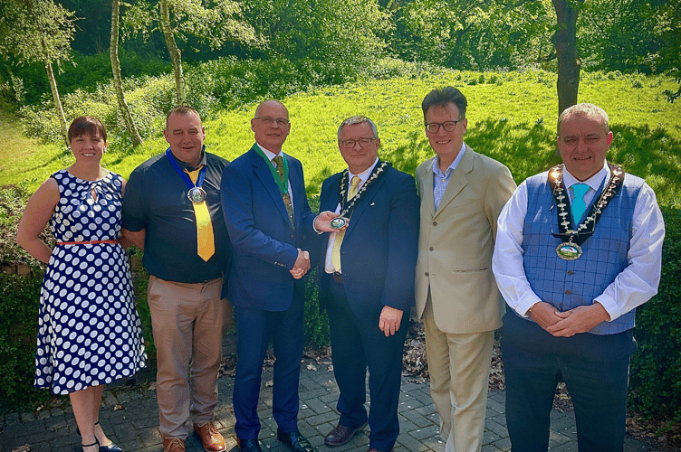 Pictured from left to right are: Emma Palmer, Chief Executive; Cllr Danny Bebb, Assistant Vice Chair; Cllr Jonathan Wilkinson, outgoing Chair; Cllr William Powell, the new Chair of Powys County Council; Cllr Jake Berriman, Leader of Powys County Council; and Cllr Geoff Morgan, Vice Chair.