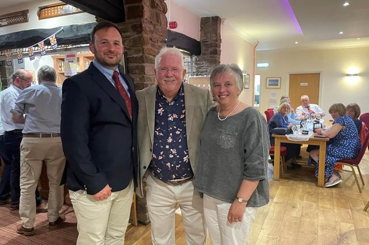 Owen Money with Club Captain Chris Reeves and Ladies’ Captain Dr Diane Davies