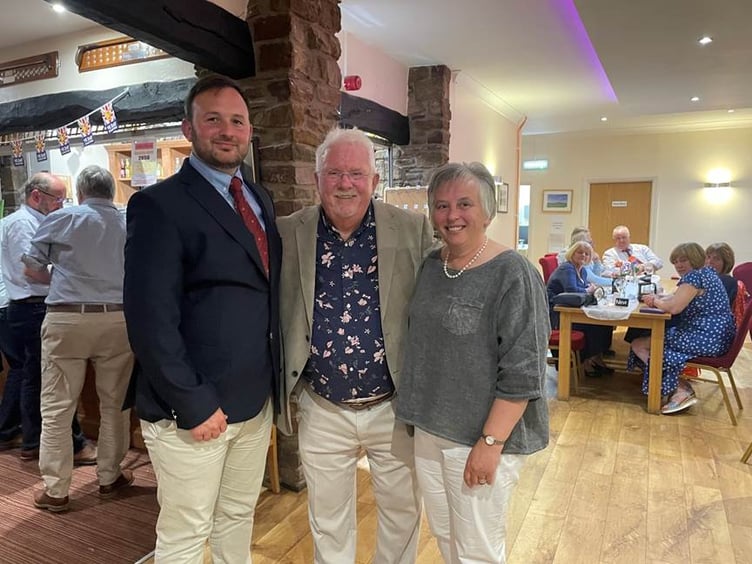 Owen Money with Club Captain Chris Reeves and Ladies’ Captain Dr Diane Davies