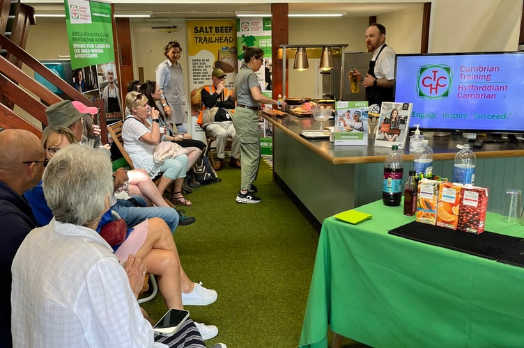 Cambrian Training Company training officer, Andrew Addis-Fuller showcasing Professional Cookery Skills to a packed house