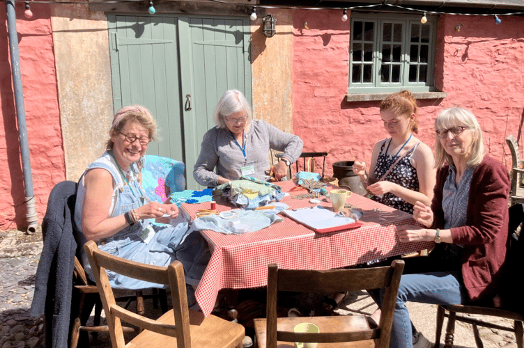The quilters, led by Emily Hedges, enjoying the sunshine
