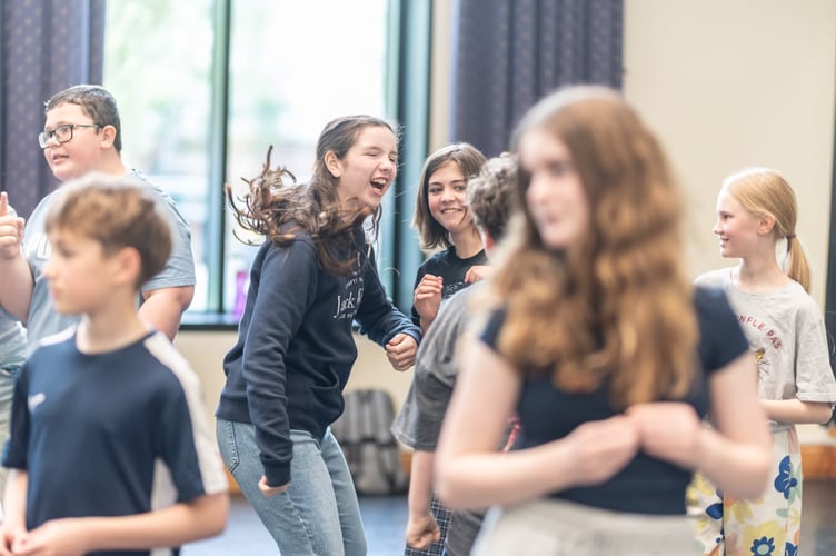 The production features around 90 local performers, from cast members to orchestra musicians