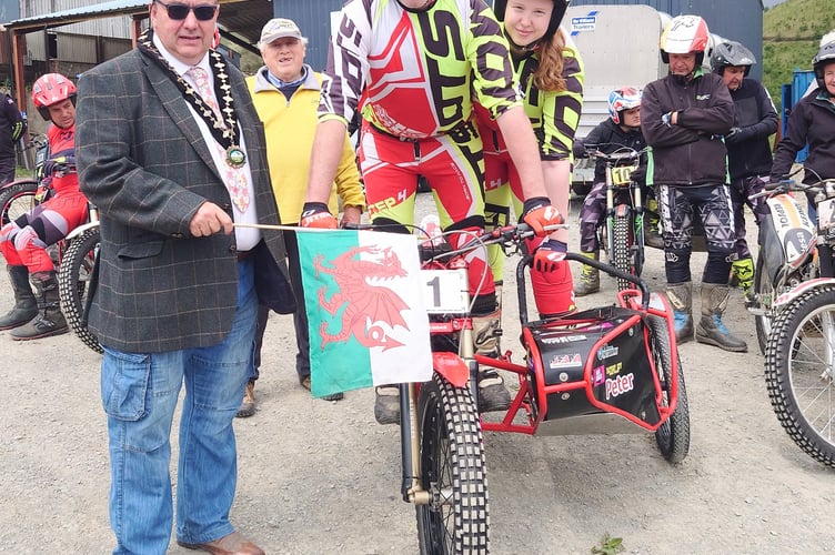 Cllr Geoff Morgan flagging off Chris Newsham and daughter Anna