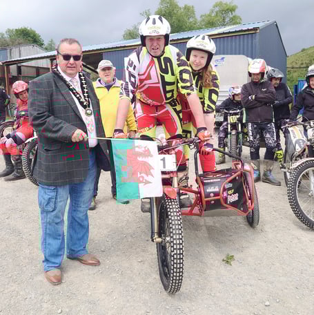 Cllr Geoff Morgan flagging off Chris Newsham and daughter Anna