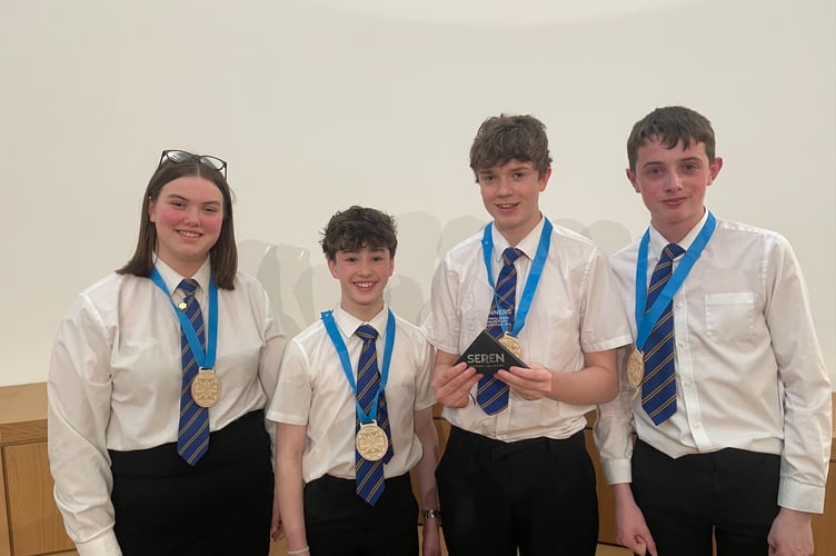 Pupils Finn Irwin, Rhydian Davies, Darcy Richards, and Eric Pearce pictured with their award