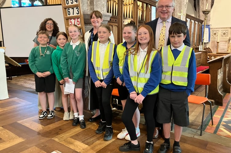 Pupils and the deputy head from St Mary’s School in Brynmawr, also a School of Sanctuary, pictured with pupils from Llangattock, headteacher Mrs Durbin, and John Meredith, Director of Education for the Diocese of Swansea and Brecon