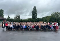 Llanfaes school celebrates glowing Estyn report