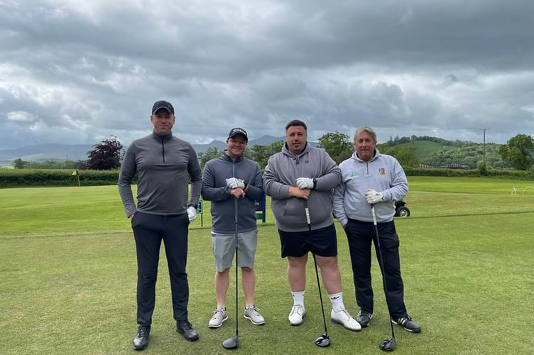 The winning team of Alex Moses, Peter Moses, Nicholas Rees, and Chris Cookery celebrate their victory at Cradoc Golf Club’s Texas Scramble Open