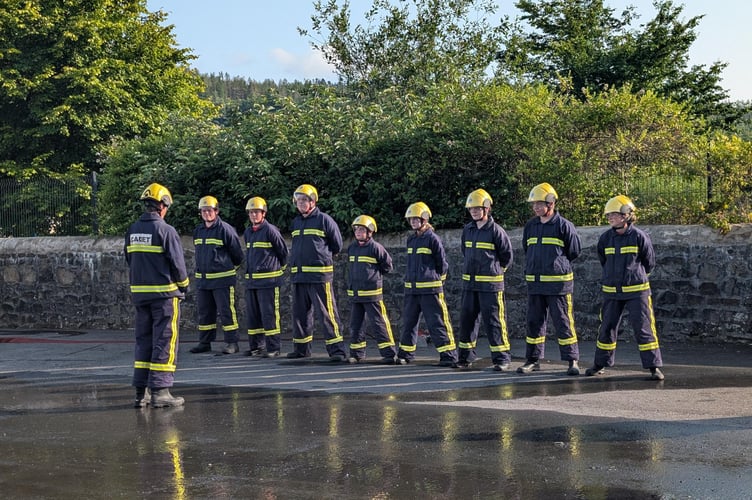 The Abercrave Fire Cadets Class of 2025 celebrate their achievement at the Pass Out Parade