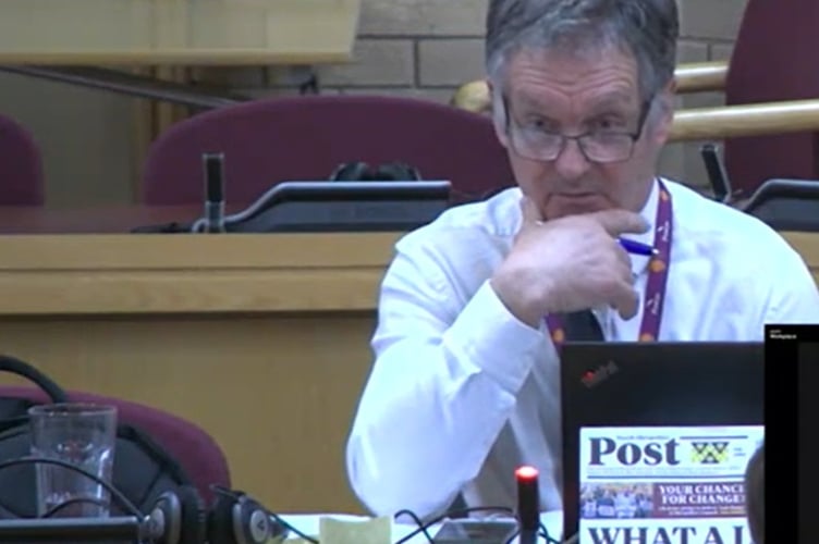 Conservative group leader Cllr Aled Davies in the chamber on March 6 with the Shropshire Liberal Democrat newsletter which celebrated the scrapping of the recycling centre booking system