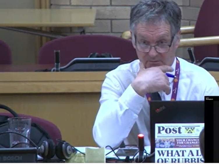 Conservative group leader Cllr Aled Davies in the chamber on March 6 with the Shropshire Liberal Democrat newsletter which celebrated the scrapping of the recycling centre booking system