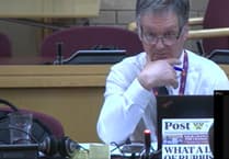Councillors could face ban on political signs at meetings