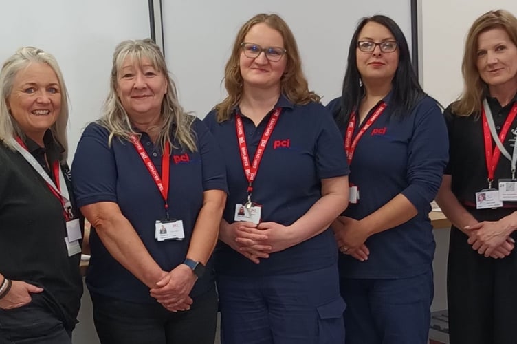 Left to right: Kate Thomas, Wales Air Ambulance’s Regional Fundraising Manager for Powys, PCI staff and coffee and cake organisers Becky Greenow, Ewa Mansfield, Izabela Grzybek, and the Charity’s Public Affairs Lead, Emma Grant