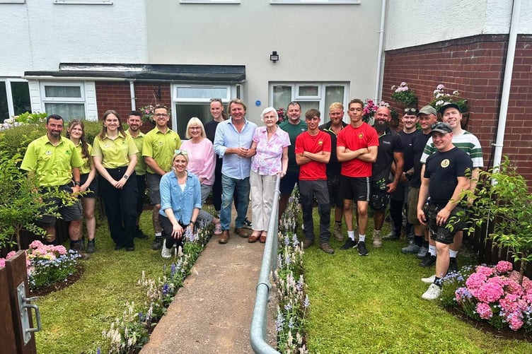 Volunteers from Old Railway Line Garden Centre joined horticulturist David Domoney and others to create an accessible garden makeover for 90-year-old Heather