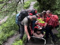 Walker rescued from waterfalls area after injuring ankle